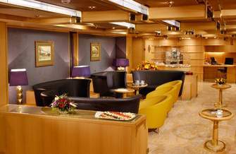 Holland America Line Vista-Class Accomodation Neptune lounge.jpg
